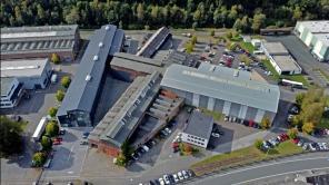 Zu sehen ist eine Luftaufnahme des Campus Buschhütten in Kreuztal.