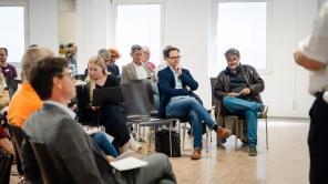 Die Bilder zeigen Einblicke in die Panel-Diskussion sowie Workshops des Fusion-Forums zur Projekt-Halbzeit.