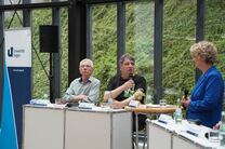 Podiumsdiskussion zum Festakt 25 Jahre universi in der Bibliothek.