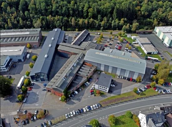 Zu sehen ist eine Luftaufnahme des Campus Buschhütten in Kreuztal.