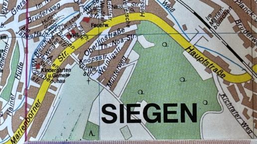 Karte mit Aufenthaltstitel auf Stadtplan Siegen liegend