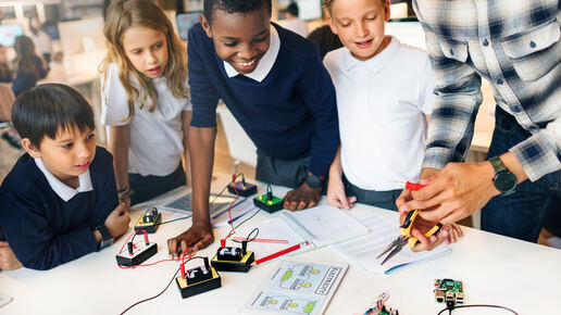 Diverse students wearing uniforms in school