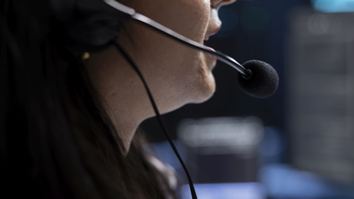 close up employee using microphone
