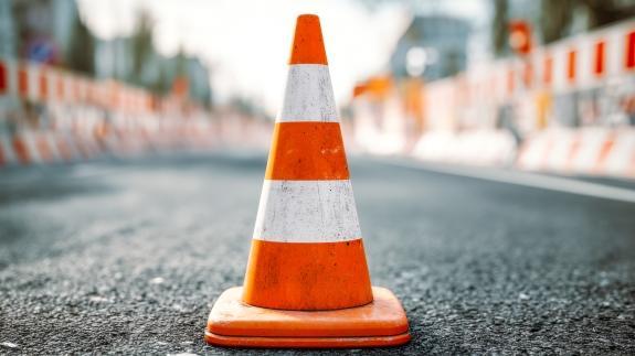Road construction zone with safety cone and barrier barricades